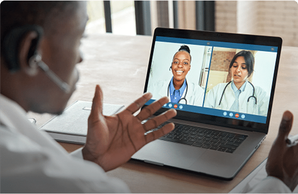Multicultural doctors team conferencing in video call chat discussing health care learning online during web seminar. Group medical webinar training, healthcare elearning videoconference concept.